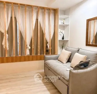 Cozy living room with elegant wooden accents and plush sofa