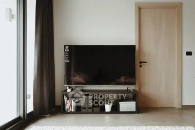 Modern living room with sleek TV setup and stylish decor