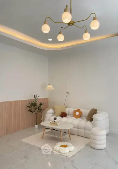 Stylish modern living room with elegant lighting and cozy seating area