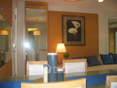 Stylish modern living room with elegant decor and cozy seating area.