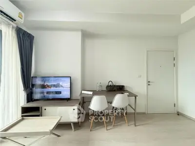 Modern minimalist living room with sleek furniture and natural light
