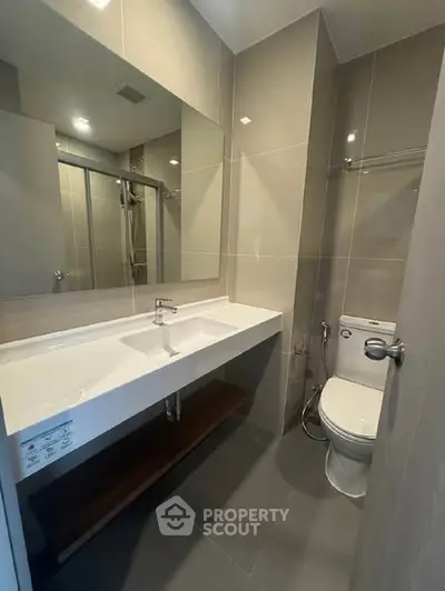 Modern bathroom with sleek fixtures and spacious design