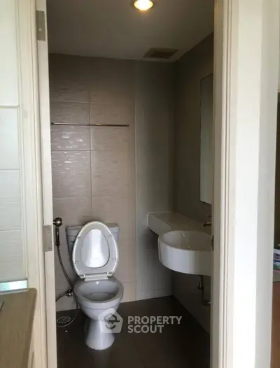Modern bathroom with sleek fixtures and neutral tones
