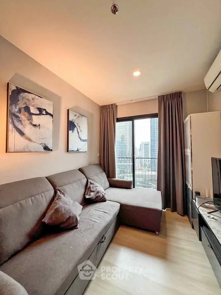 Modern living room with city view, stylish decor, and comfortable seating.
