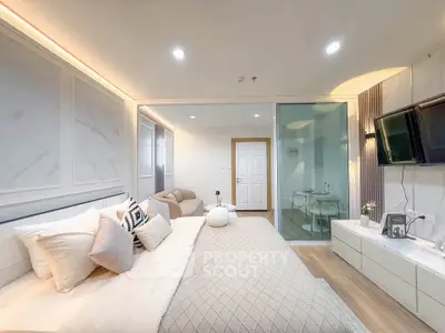 Luxurious modern bedroom with elegant decor and cozy ambiance