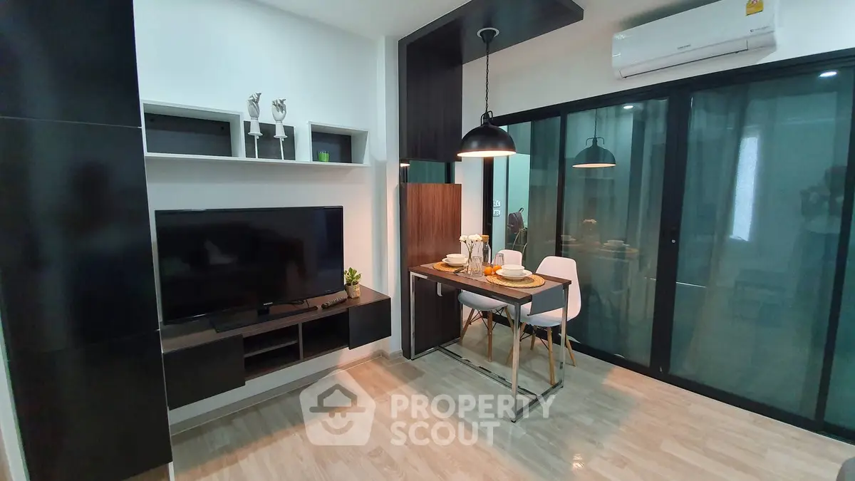 Modern living room with dining area and sleek decor