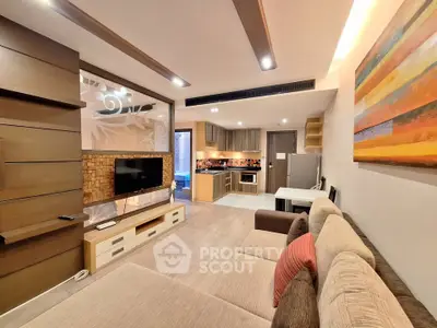 Modern living room with open kitchen and stylish decor