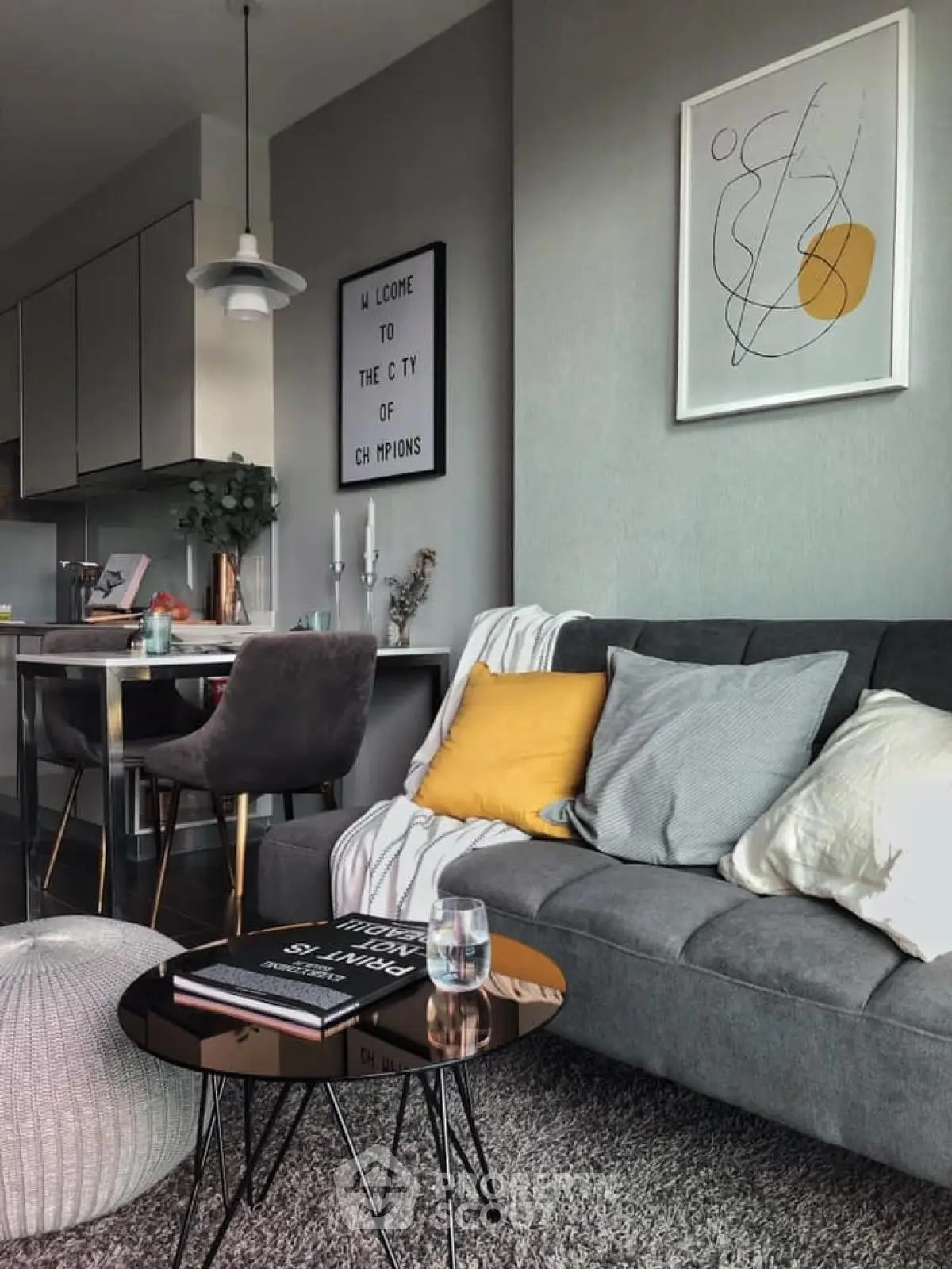 Stylish modern living room with cozy gray sofa and chic decor