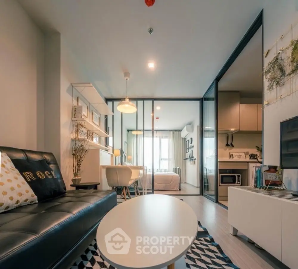 Modern living room with stylish decor and open layout in a contemporary apartment.