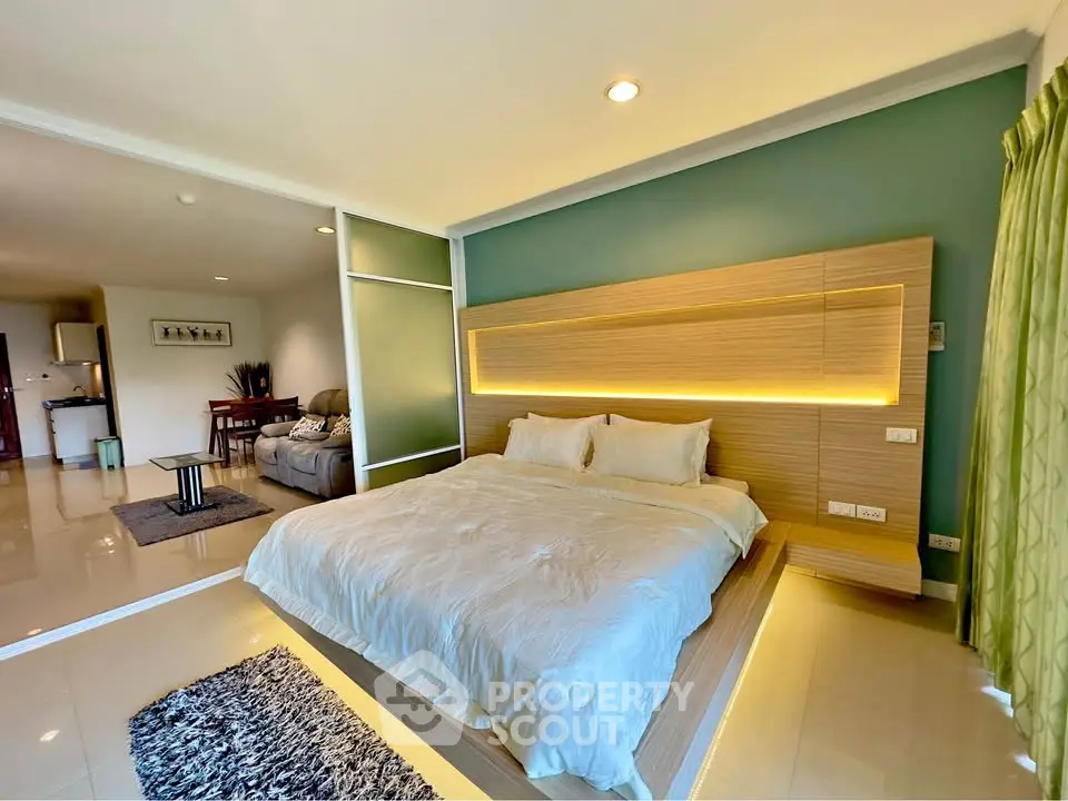 Spacious modern bedroom with stylish lighting and open layout