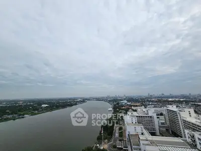 Stunning panoramic river view from high-rise building, perfect for urban living enthusiasts.