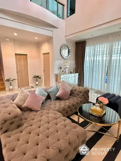 Luxurious living room with plush sofa and elegant decor in modern home