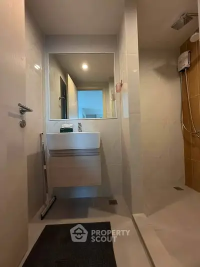 Modern bathroom with sleek design and spacious shower area