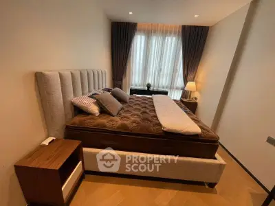 Luxurious bedroom with elegant decor and natural light