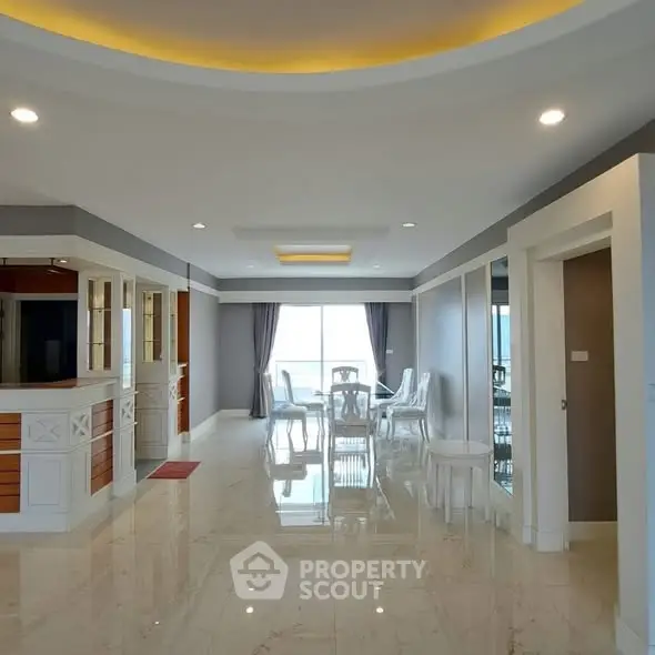 Spacious modern living room with elegant marble flooring and open layout