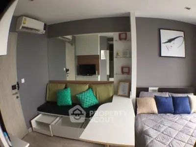 Modern studio apartment with stylish decor and cozy living area