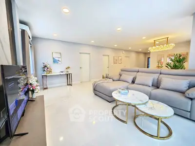 Spacious modern living room with elegant decor and plush seating