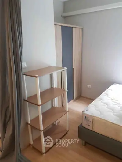 Cozy bedroom with minimalist furniture and natural light