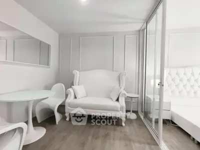 Elegant white living room with modern furniture and glass partition