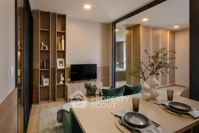 Modern living room with stylish decor, open layout, and elegant dining area in a contemporary apartment.