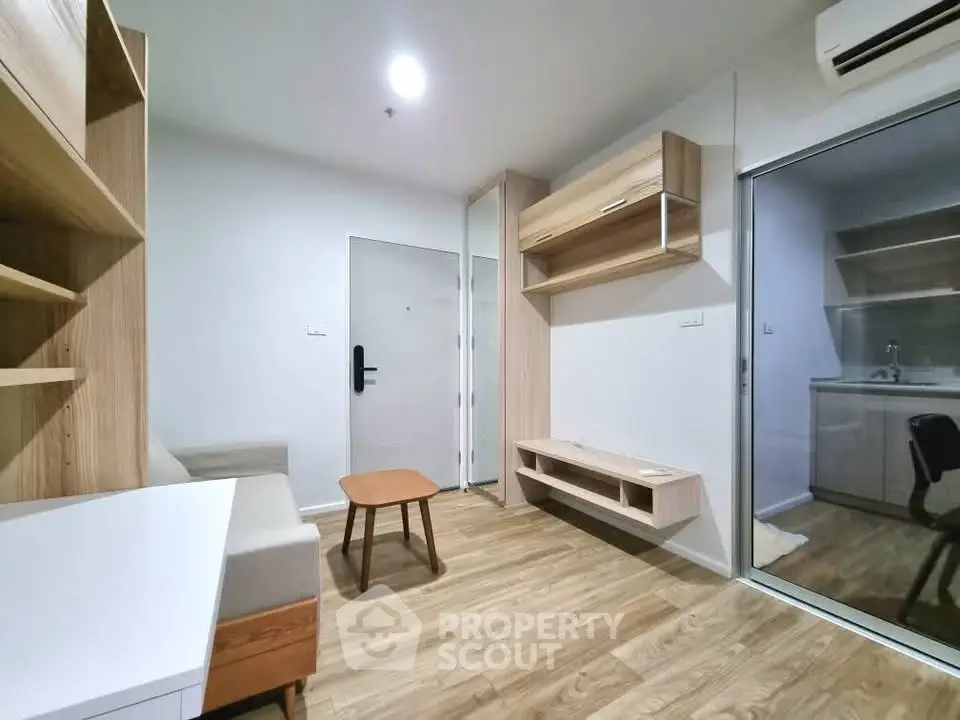 Modern living room with wooden flooring and minimalist furniture design