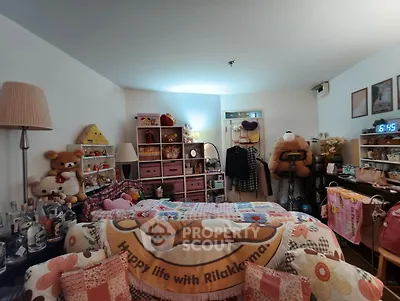 Cozy and playful bedroom with plush toys and colorful decor