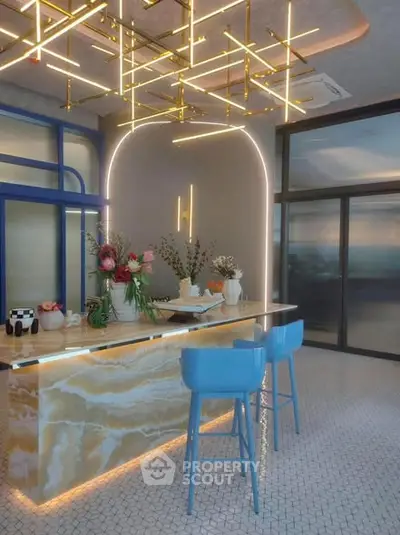 Modern kitchen with elegant lighting and marble island