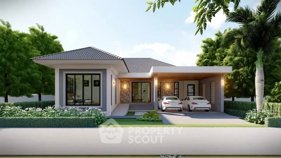 Modern single-story house with two-car garage and lush landscaping