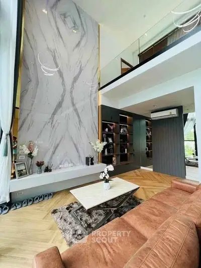 Luxurious modern living room with high ceilings and elegant decor