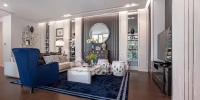 Luxurious living room with elegant decor, plush seating, and stylish accents, perfect for modern living.