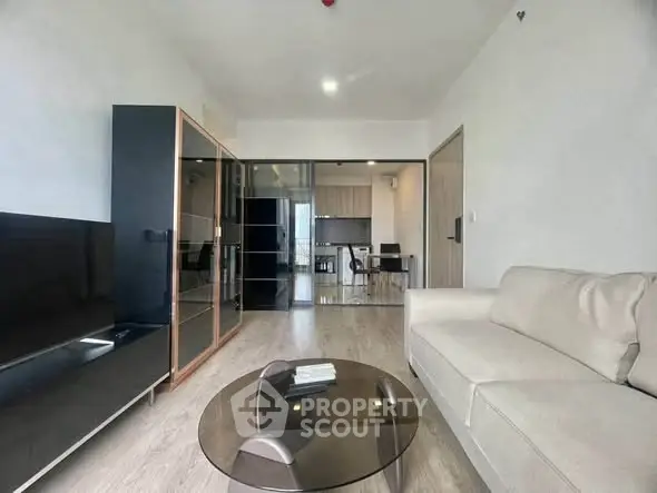 Modern living room with sleek furniture and open layout, perfect for contemporary living.