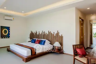 Luxurious modern bedroom with stylish decor and ambient lighting