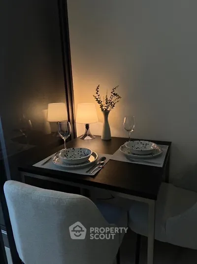 Cozy dining nook with elegant table setting and ambient lighting