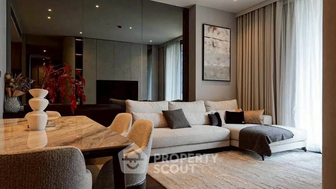 Luxurious modern living room with elegant decor and cozy seating area.