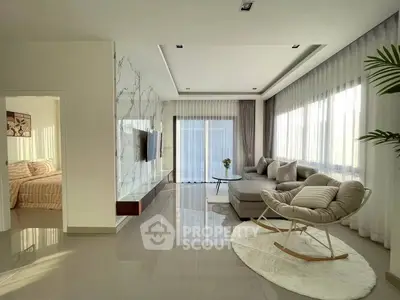 Elegant living room with modern decor and natural light