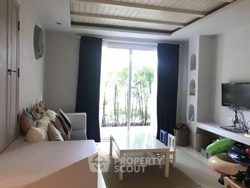 Cozy living room with modern decor and garden view