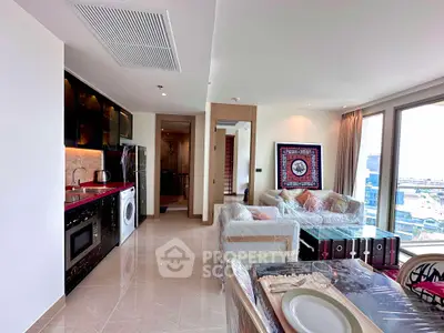 Luxurious open-plan living room with modern kitchen and stunning city view