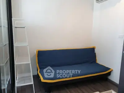 Cozy small living room with modern sofa and minimalist decor