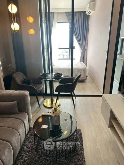 Modern living room with stylish furniture and natural light