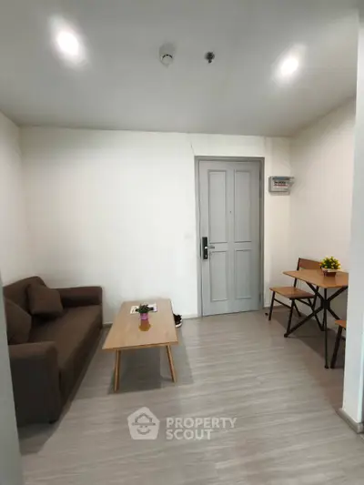 Cozy living room with modern furniture and wooden flooring