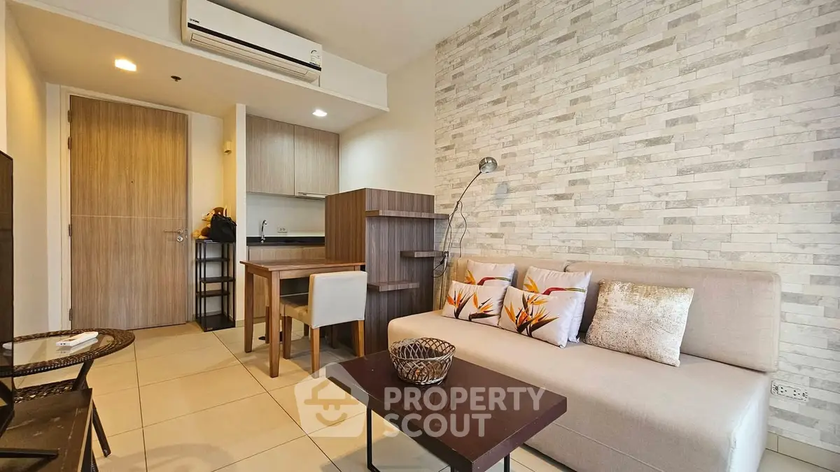 Modern living room with stylish decor and open kitchen layout