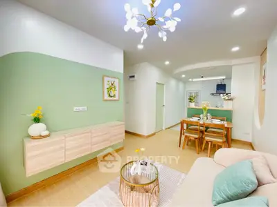 Stylish modern living room with pastel accents and elegant dining area