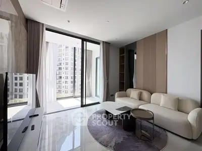 Modern living room with sleek design and city view balcony