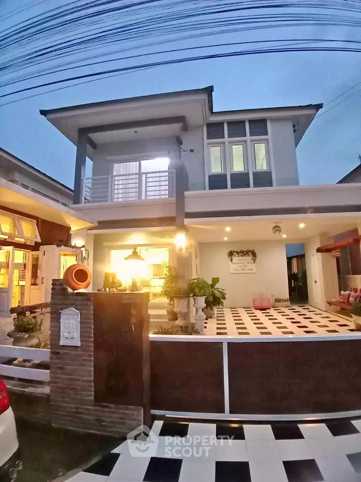 Modern two-story home with stylish facade and spacious driveway