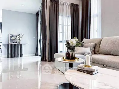 Elegant living room with modern decor and natural light