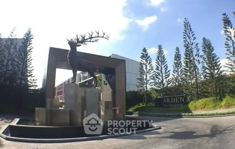 Elegant entrance with deer sculpture at Arden residential complex