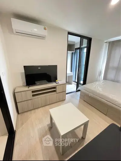 Modern living room with air conditioning and sleek furniture in a cozy apartment