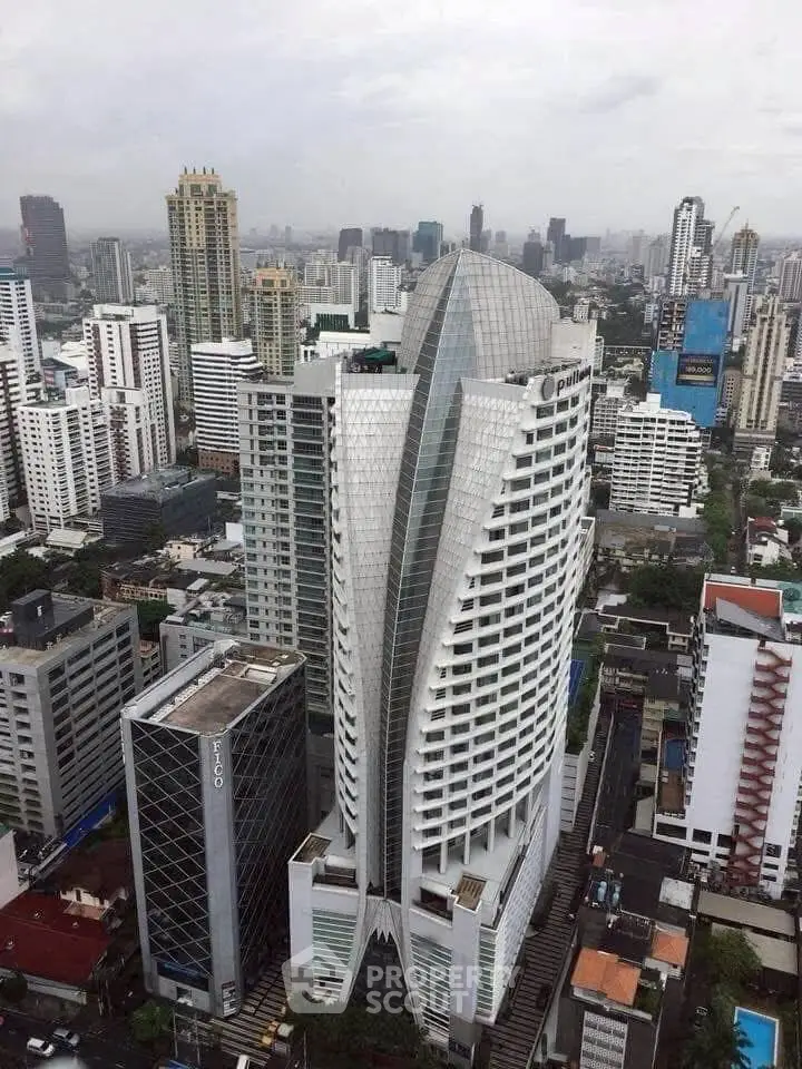 Stunning aerial view of modern high-rise building in bustling cityscape