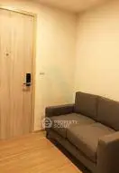 Cozy living room with modern sofa and wooden flooring