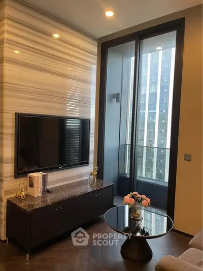 Stylish living room with modern decor and large window offering city view